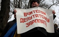 Украинские учителя подняли на смех премьер-министра Николая Азарова